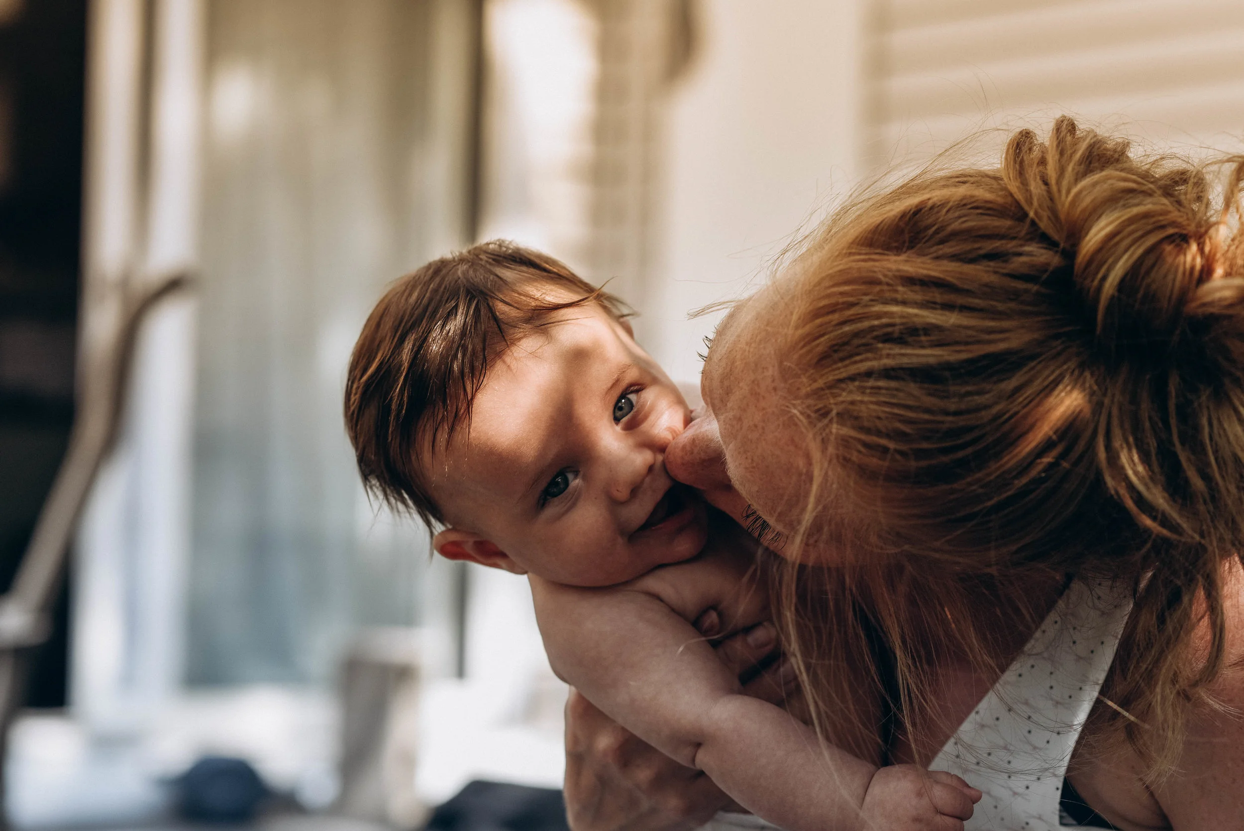 Jennifer_Kissing_Baby_Postpartum.jpg