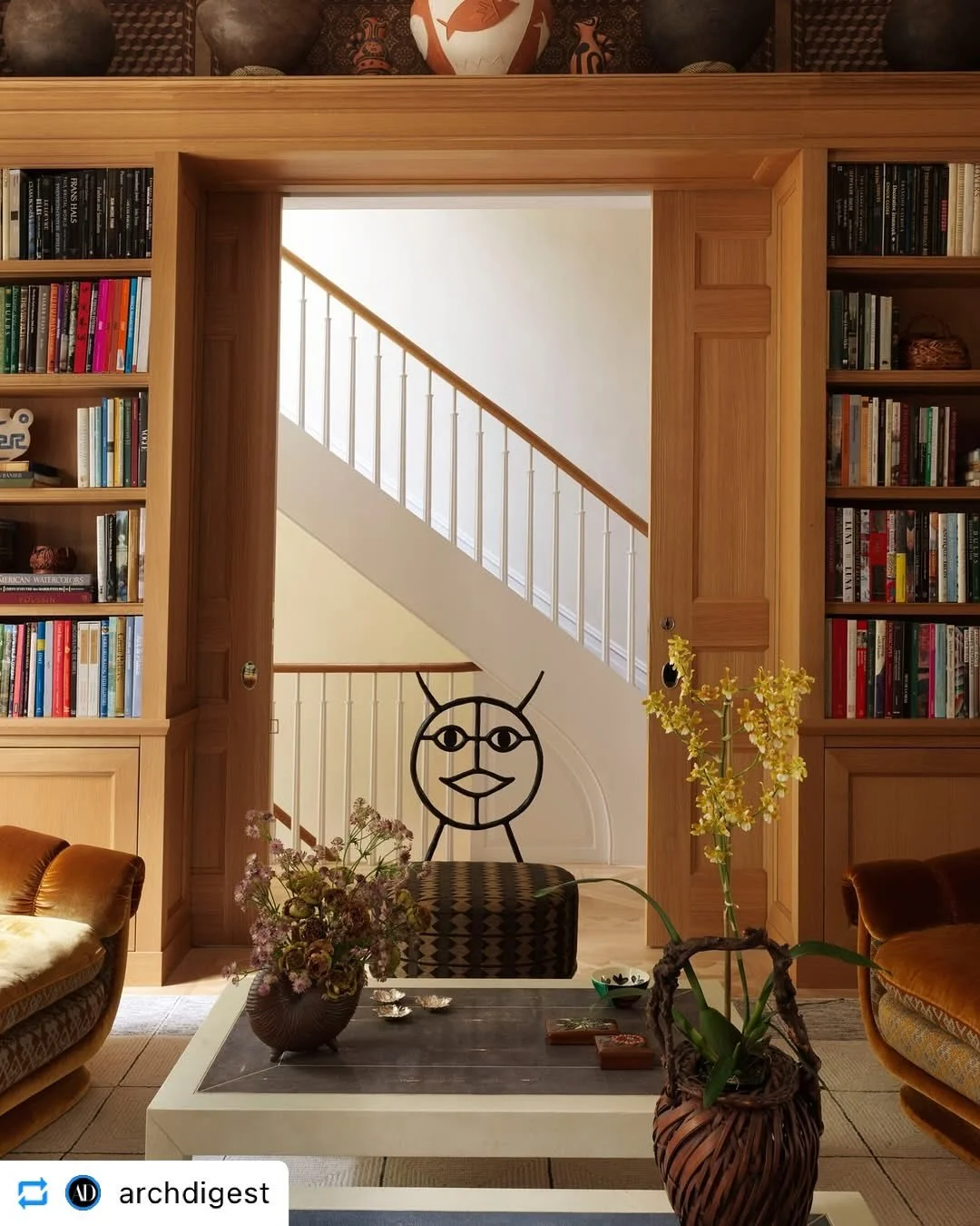 the library at our 1820s townhouse renovation took a deep level care to restore its original historic details like the plaster moldings. The moldings all done by hand, plus new millwork, wall coverings, parquet flooring, custom integrated lighting an