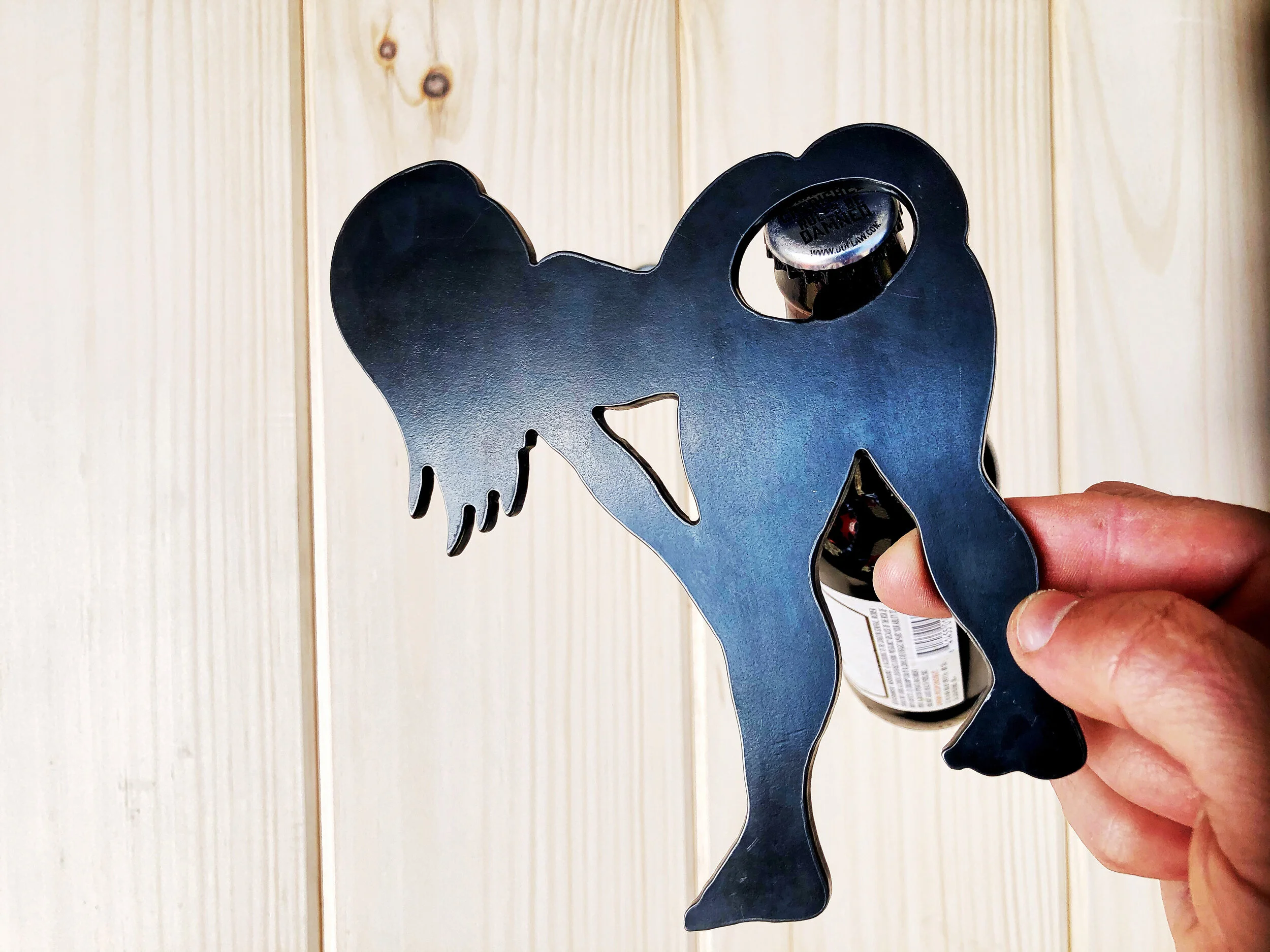 thick_girl_bending_over_metal_bottle_opener_0004.JPG
