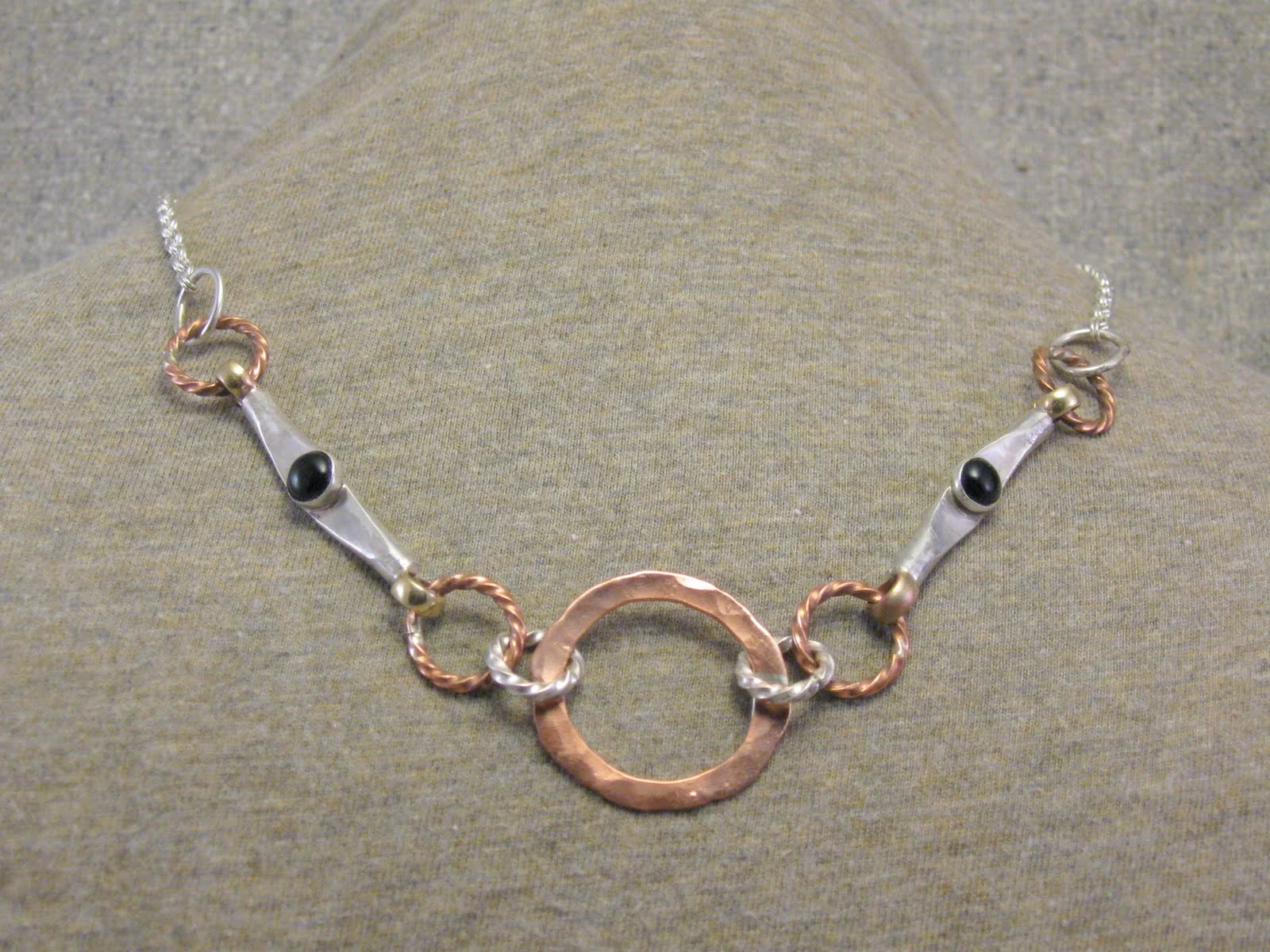 stonebars and circles necklaces