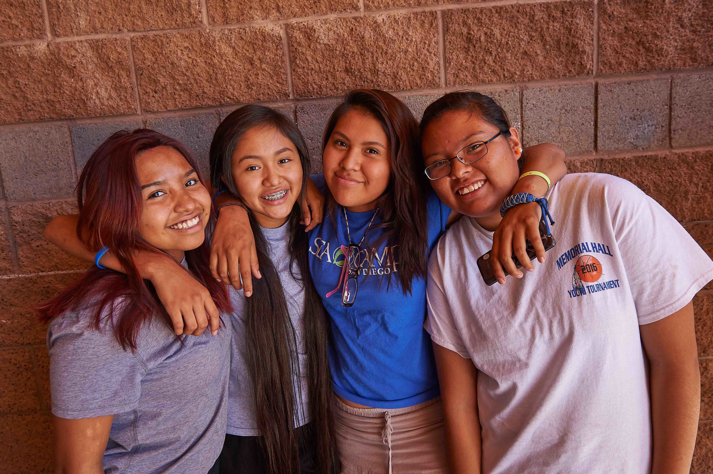 Female participants connect during an adolescent health program in Whiteriver, AZ/Fort Apache in 2016. Photo credit: Ed Cunicelli