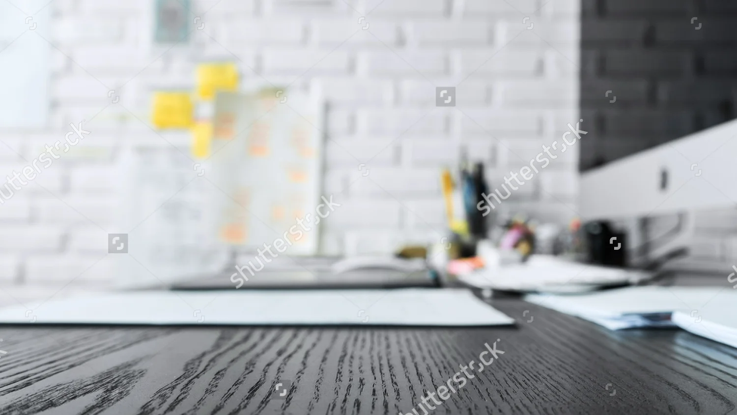 stock-photo-wood-working-table-in-black-and-computer-with-copy-space-top-view-for-table-background-ideas-and-531688636.jpg