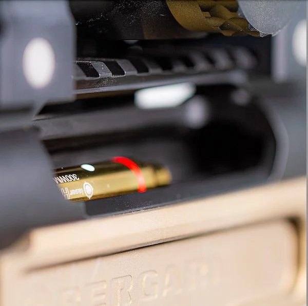 LaserHIT HD/LR Laser Cartridge chambered in a precision rifle, ready for indoor dry-fire training.