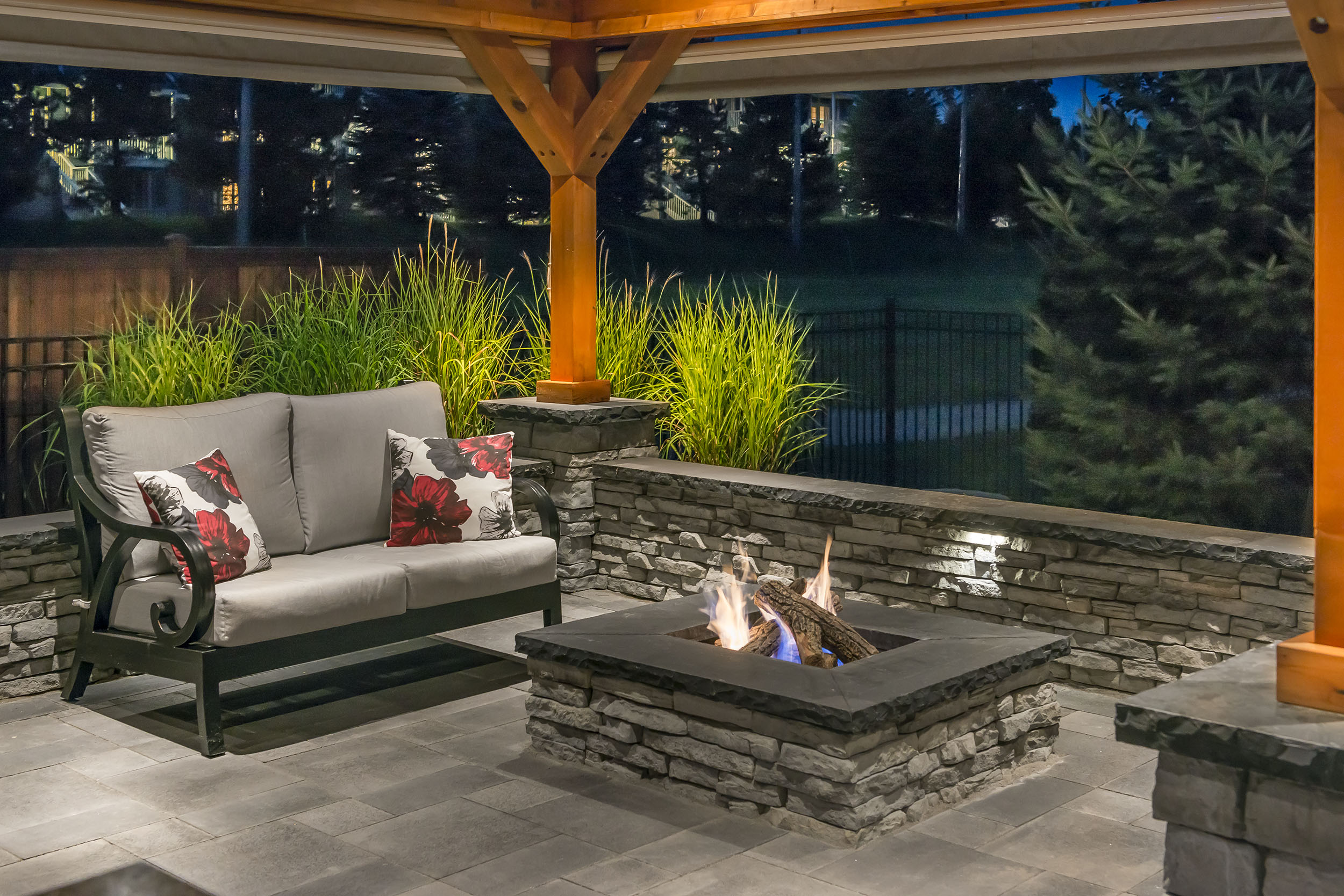 Outdoor living at night with fireplace in York, Harrisburg and Lancaster, PA