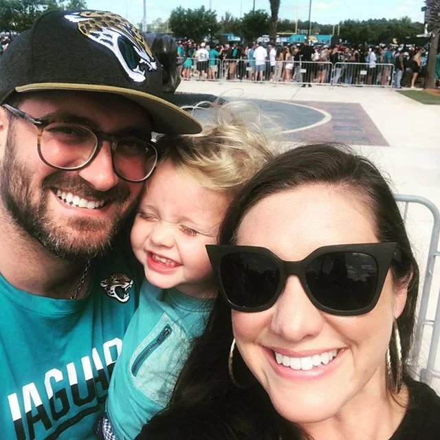 Cheesing before the @jaguars game! Walter has perfected the pre-game smile. .
.
.
.
.
#thebabywalt #jacksonvillejaguars #jacksonville #duval #jaguars #jags #gojags #blackandteal #family #westillbelieve #familytime #🖤