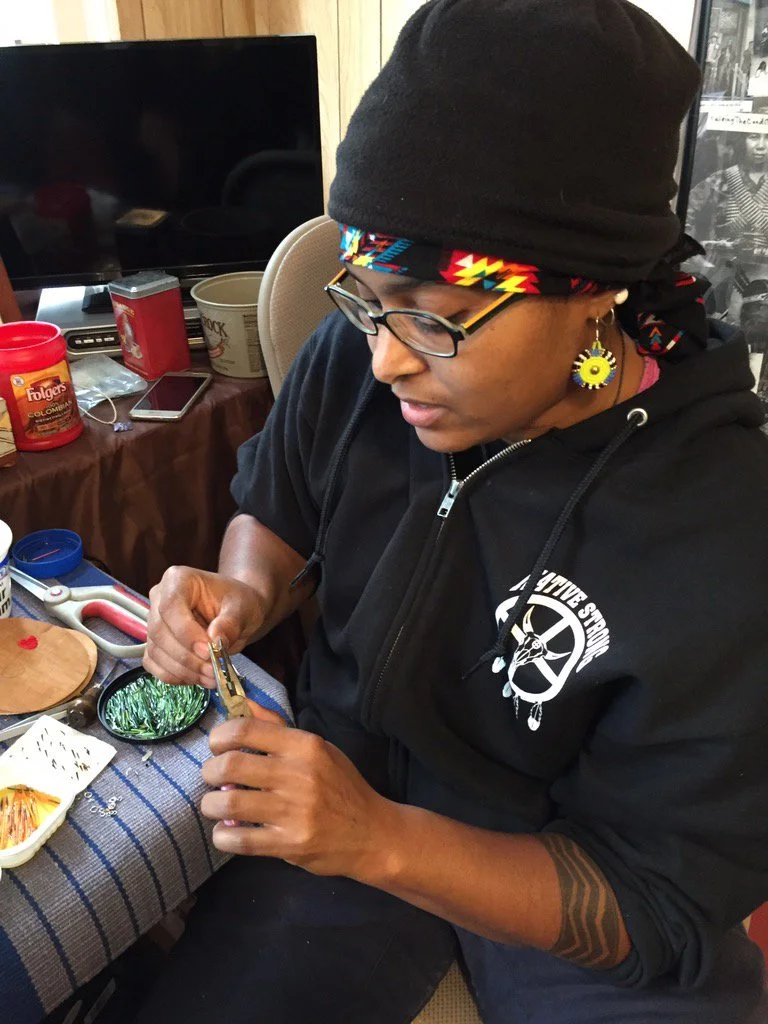 Yani working at Tomaquag