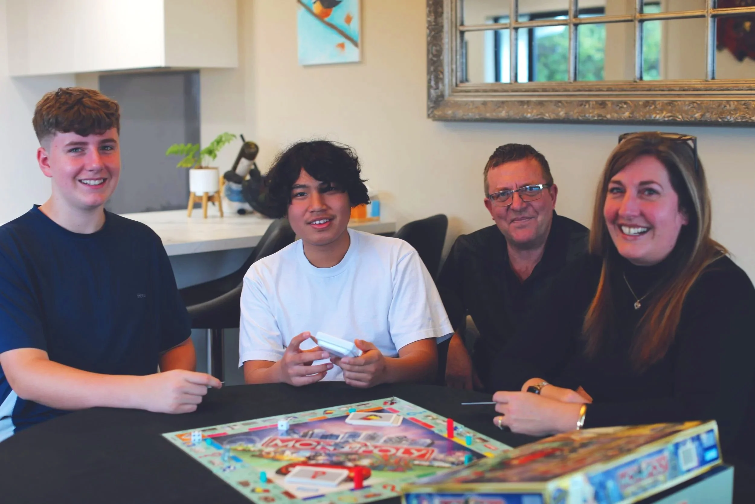 Host Family together playing Monopoly.jpg