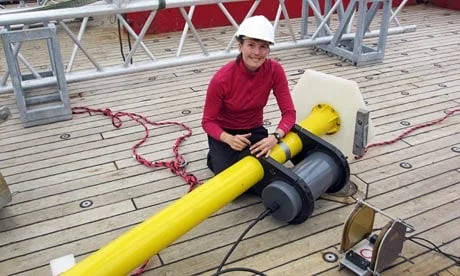 Helen Czerski on the deck of British Antarctic Survey ship, attaching her bubble measurement devices to the buoy that will carry them. Photograph: Helen Czerski