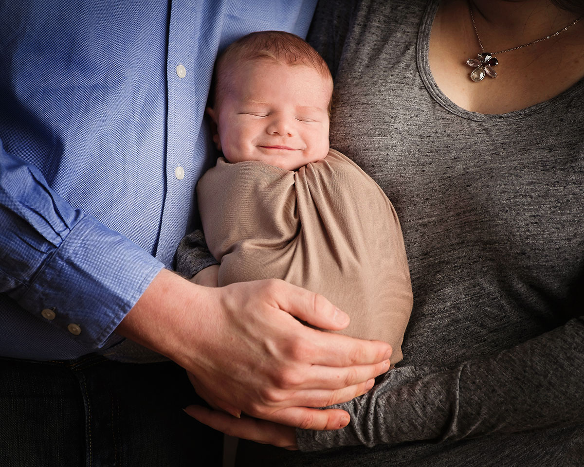 Newborn baby smiling.jpg