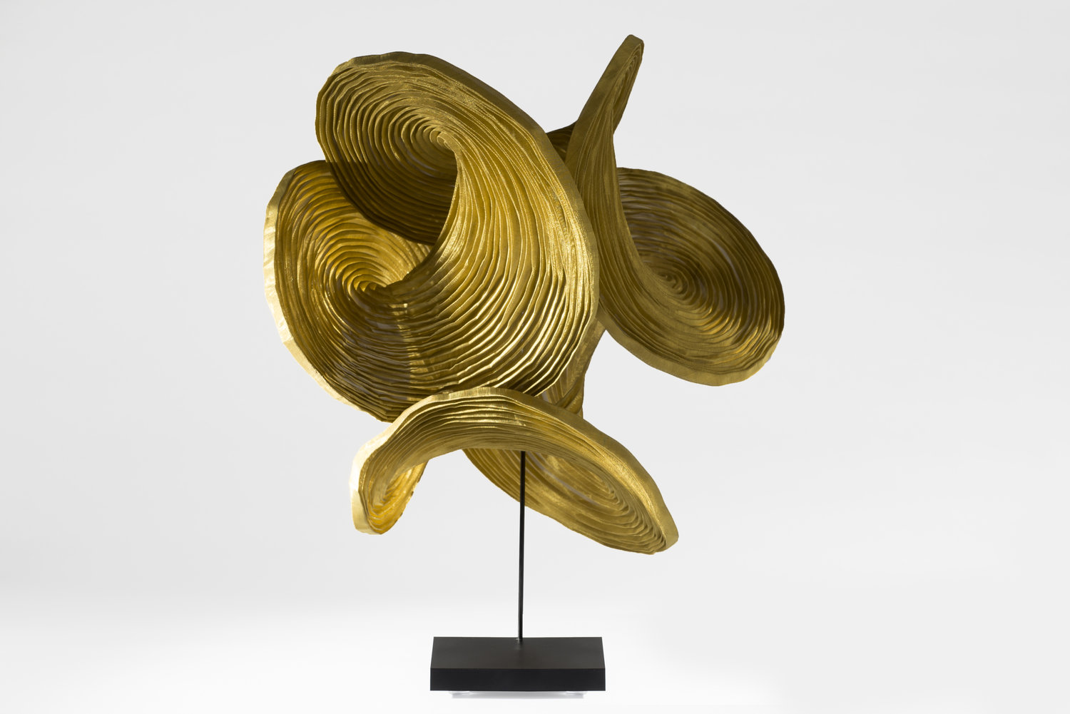 Infinito Tabletop Sculpture in Gold.jpeg