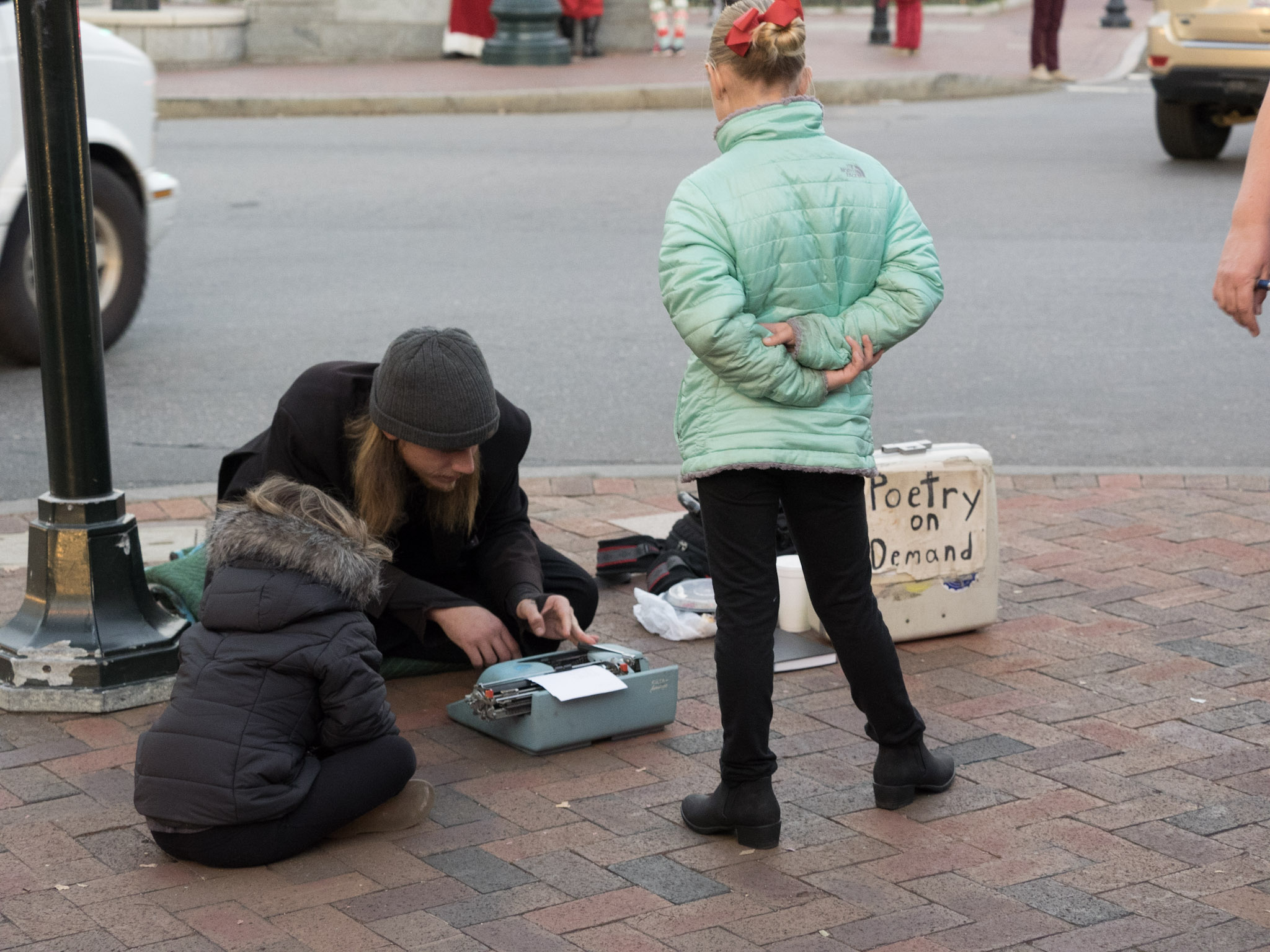 A busker on the streets of Asheville, NC. And yes, I did get a poem from him :)