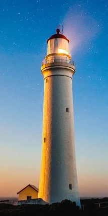 Lighthouse, rooted & tall