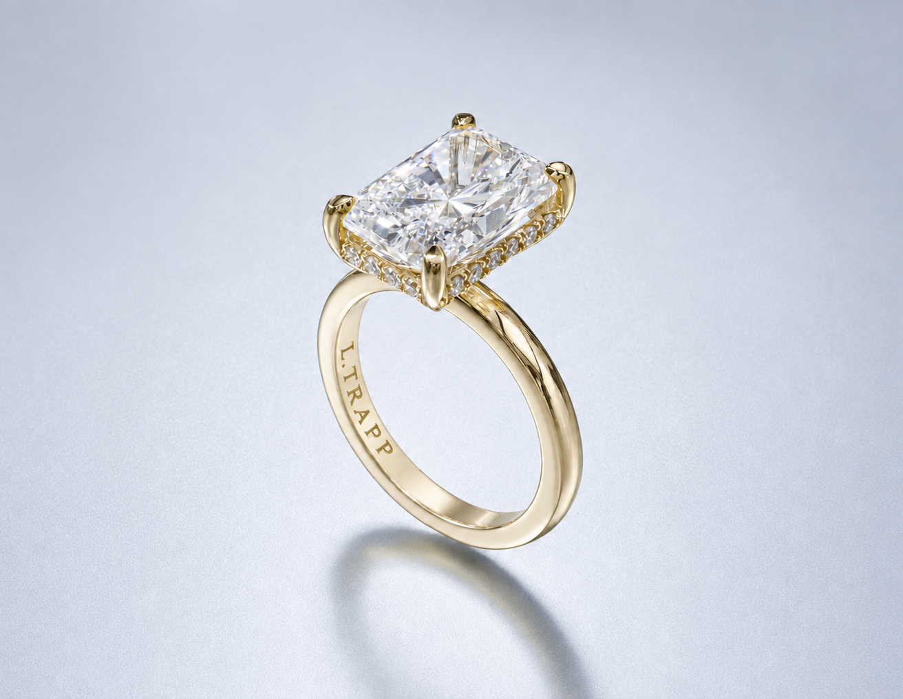 14K Yellow Radiant diamond ring Hidden Halo Side View.png