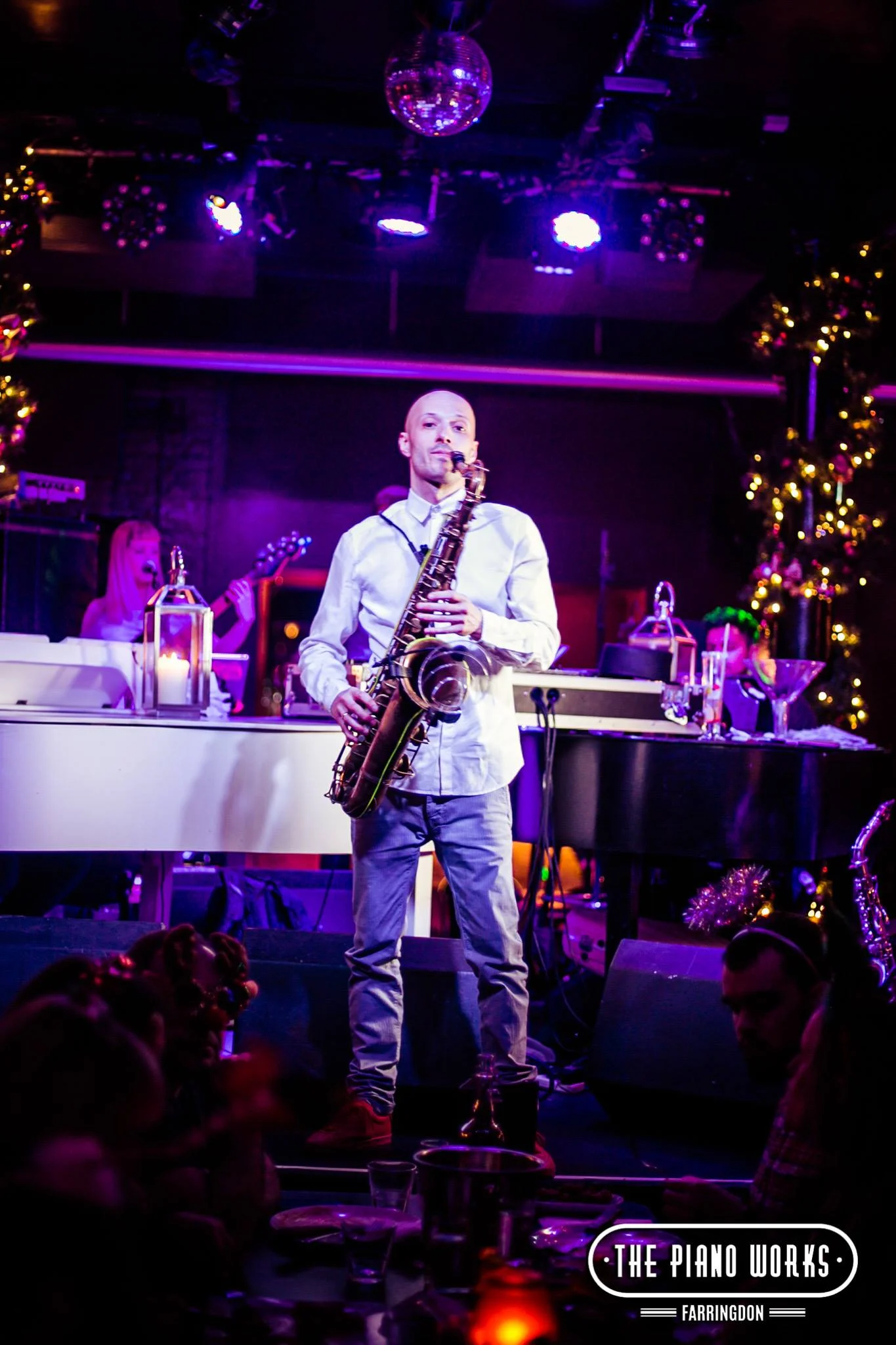 Adj sax in hand pose.jpg