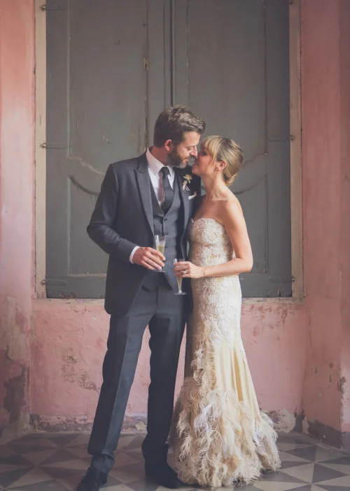 gold and white lace ostrich feather wedding dress