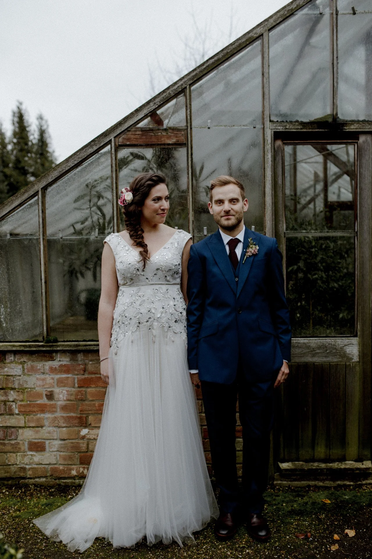  a wedding dress in embroidery with embroidered with organic lines of bold sequins and faceted beads to create a bodt contouring effect. 