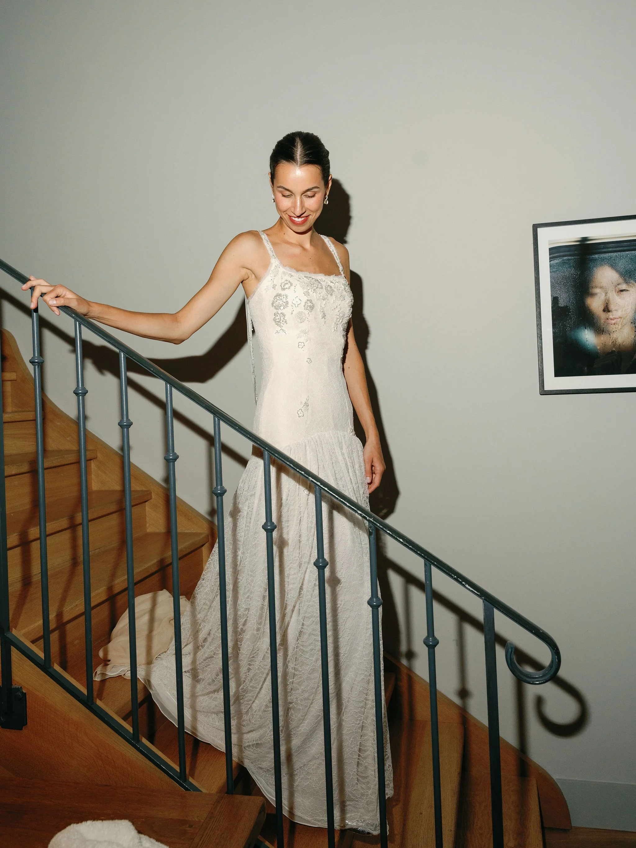  A luxury fashion bridal gown. slim fitting with. a dropped waist, delicate lace overlay and embellished with sparkling silver bead motifs. Featured on Vogue. 