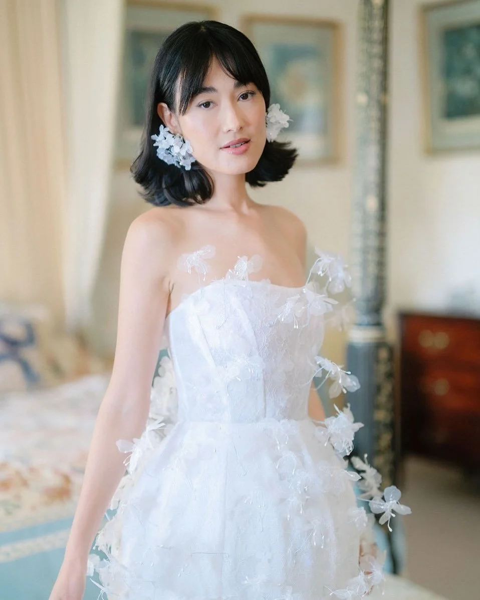 Paris Couture week saw Pom Pom flower earrings at Dior.

I create whatever my brides need to complete their look, from earrings to handbags. This additional service is only available to brides commissioning their dress with Wilden London.

Image cred