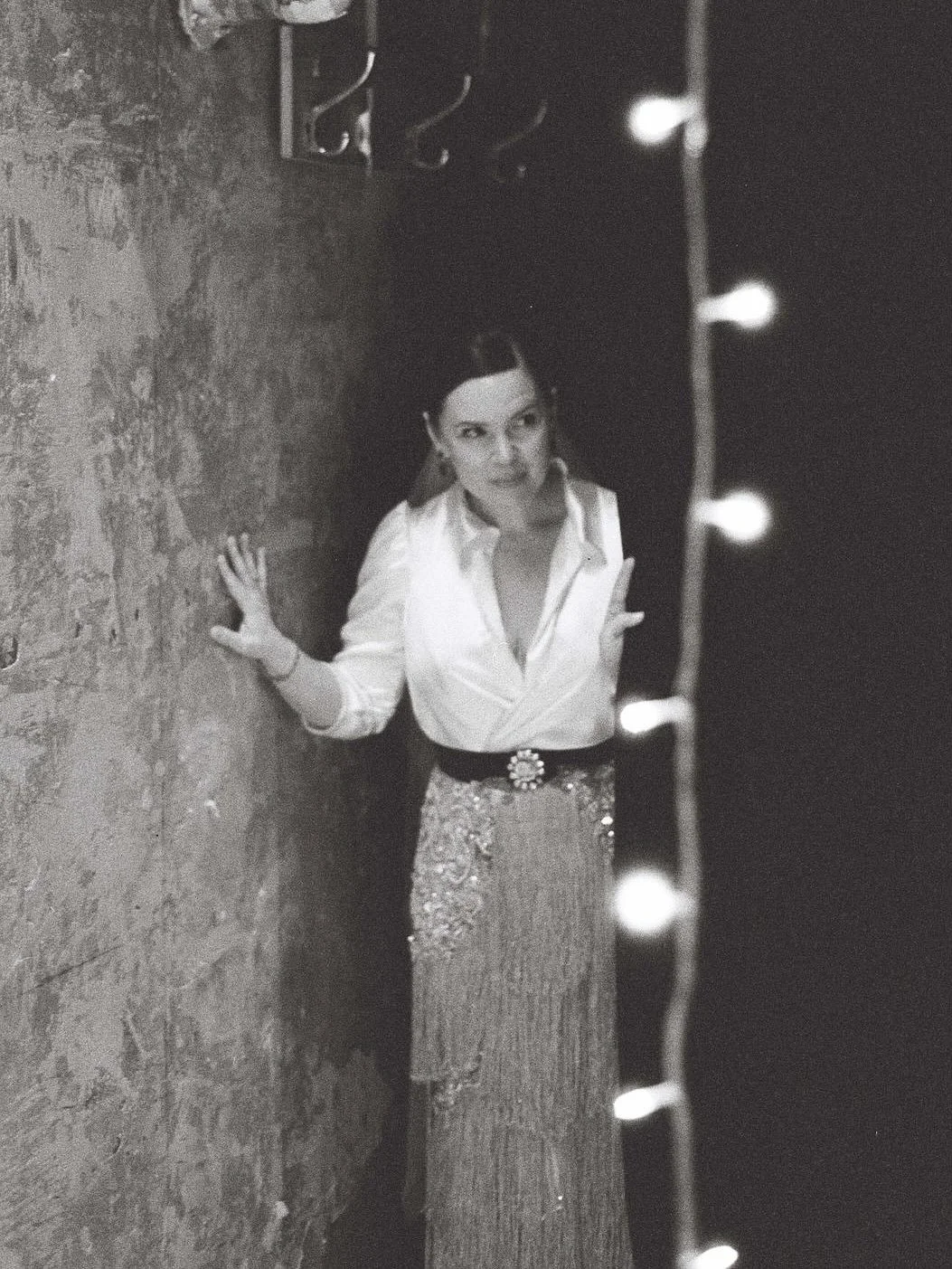 Everybody is talking about THAT gold fringe dress from Schiaparelli.

Fringing can very very versatile, creating a sleek day look to a fun party look all in one.

For Nat, we dyed the perfect gold shade, and created intersecting and angular layers fo