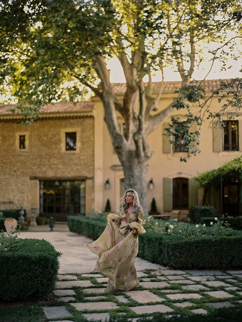 The Rehearsal Dinner dress.

Organza is a rare material that holds both structure and movement. Sculpted into sheer, voluminous shapes, the woven stiffness gives lift and architecture, yet remains weightless. 

A breeze ripples the fabric, folding an