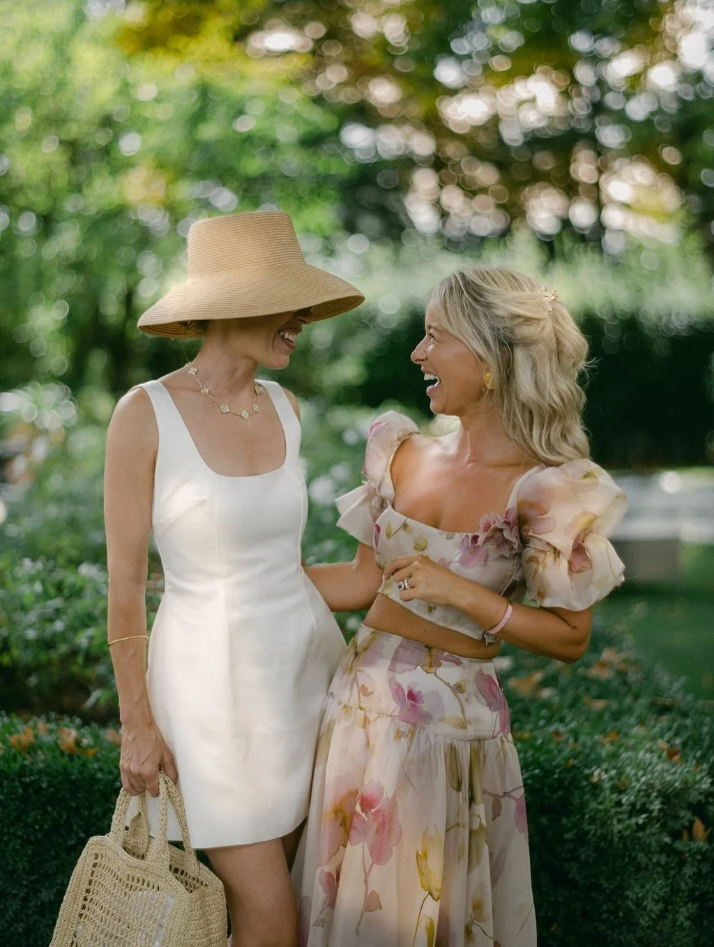 This bespoke pool party co-ord was created from the bride&rsquo;s own watercolour artworks printed onto silk organza. 

The silhouette is light and playful - structured crop top with gentle puff sleeves, paired with a low, dropped waist skirt that sk