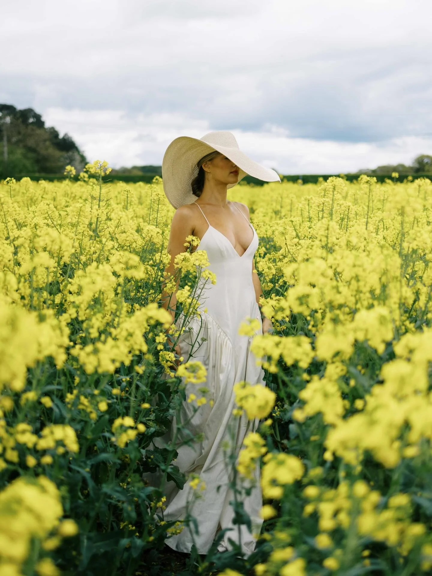 Always choose to have fun in your wedding dress.

Silk moir&eacute;, cut with a dropped waist and softened hip panniers, gives the gown its quiet sense of structure, while gathered panels give movement. Regal in construction, but intentionally undone