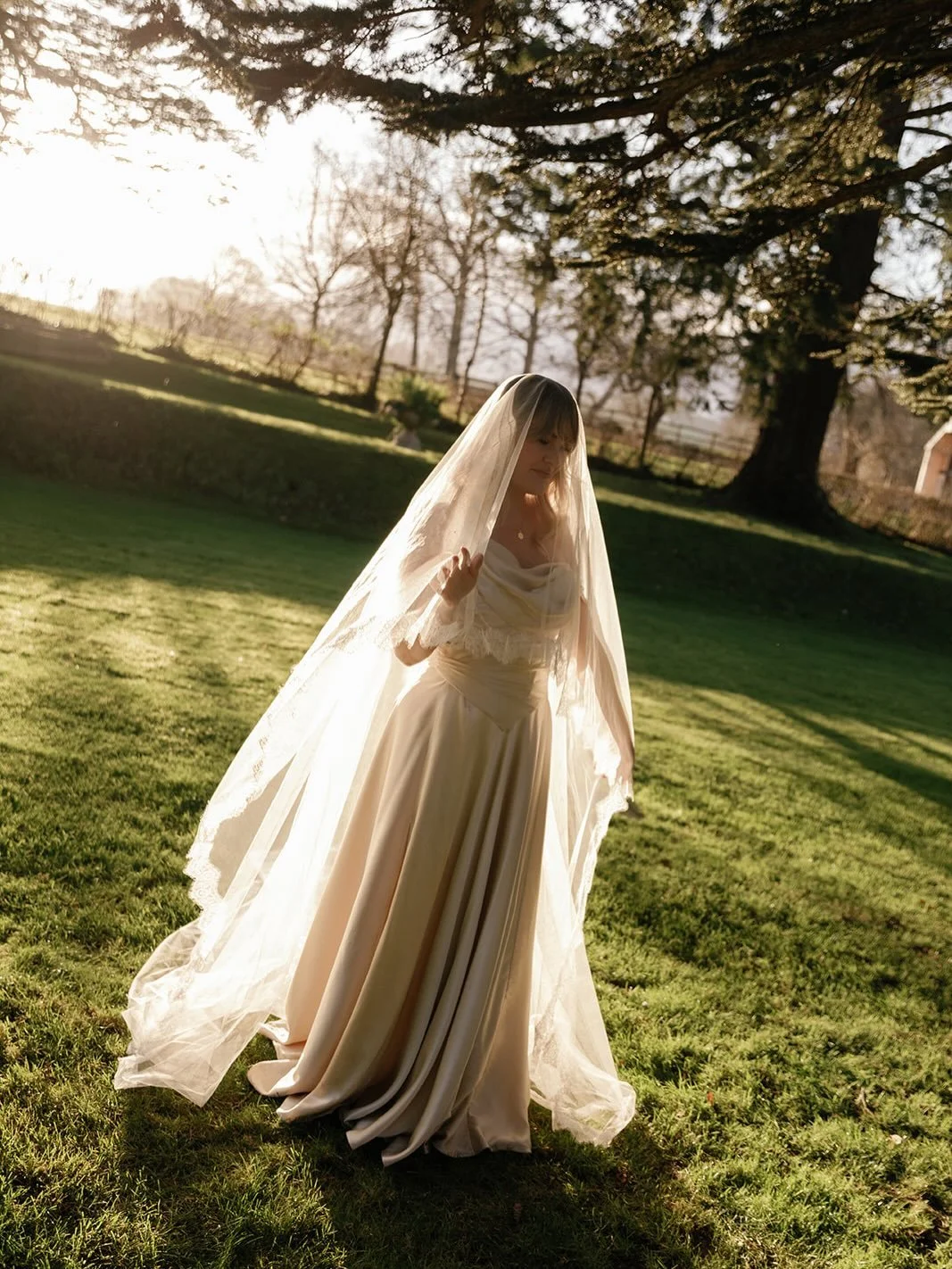 A wedding dress at Golden hour, seen through the eyes of the bride who usually stands behind the lens.

I first met EmmyLou while creating a bespoke gown for a shared bridal client&mdash;she was the photographer, quietly shaping the atmosphere with h
