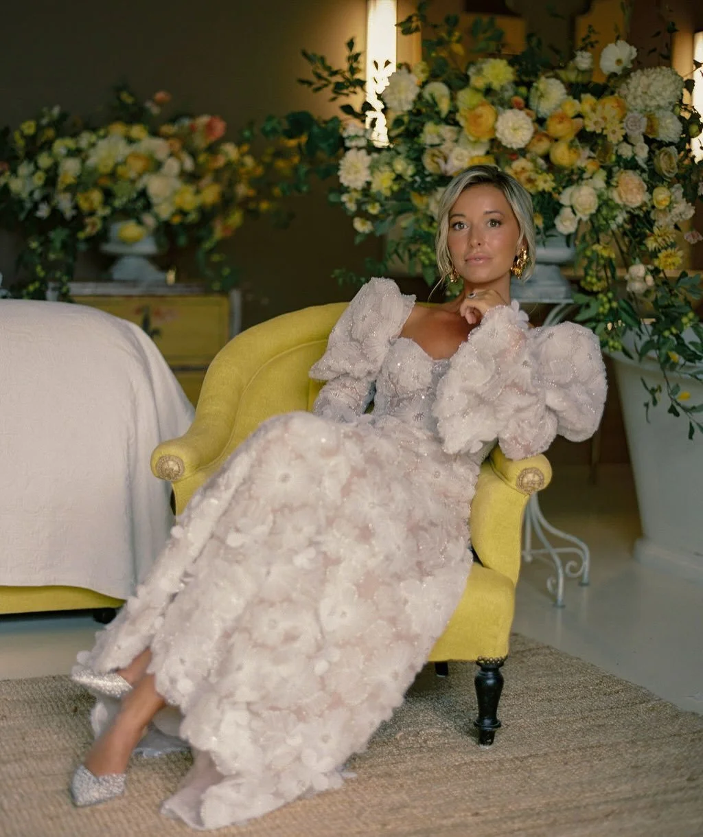 A swatch, left quietly on the table, soft tulle embroidered with light-catching glass beads. Katie was immediately drawn to it, and in that moment the dress began to take shape.

We leaned into its delicacy, building a silhouette around the fabric. V