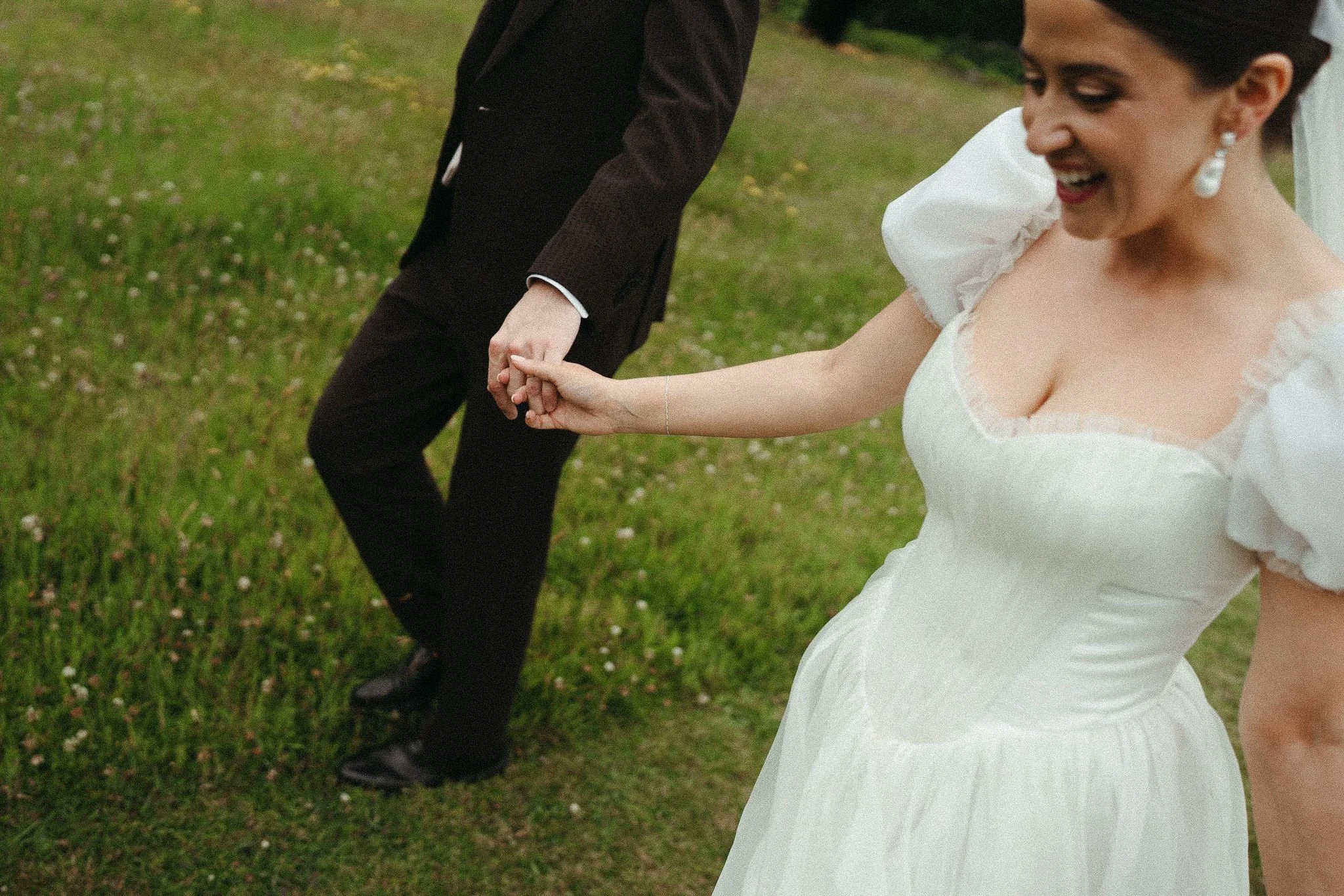 sculpted wedding dress corset with gathered and pleated organza, delicate ffrill at the neckline.
