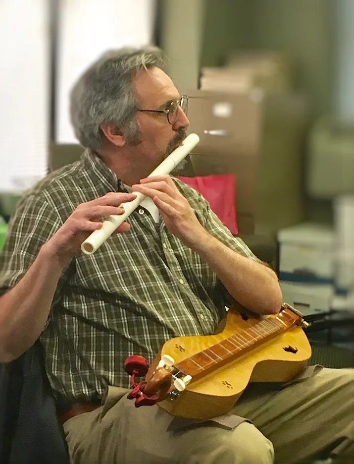 Tony playing flute.jpg
