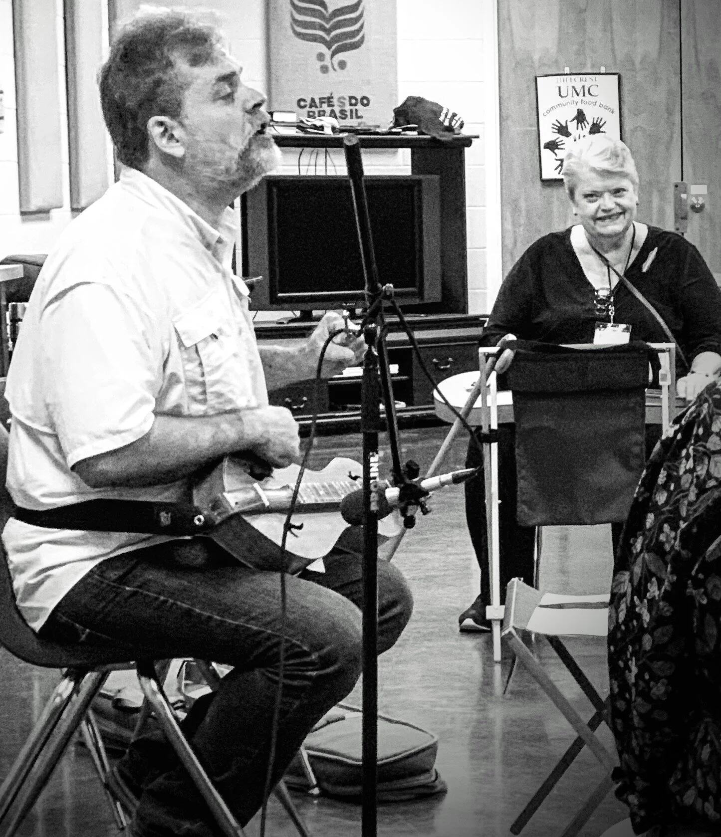 Stephen leads the workshop while Nancy, his proud mom, looks on.