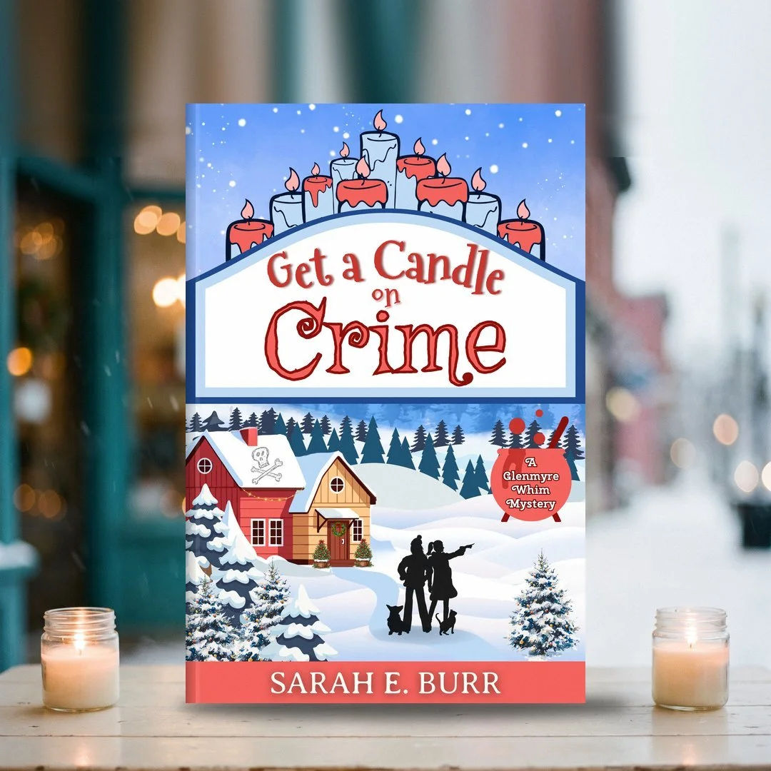 A winter storm, a power outage, and a candle shop packed with panicked customers.

In GET A CANDLE ON CRIME, Hazel Wickbury is running her shop in Crucible, NY by generator light while her aunt Poppy, still struggling after losing her aura-reading ab