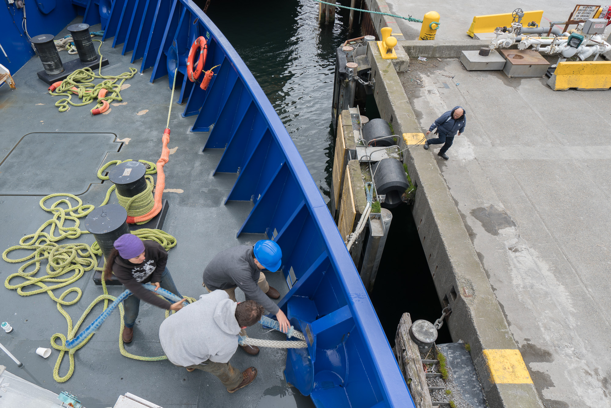 Hauling in the dock lines. Photo credit: Andrew McDonnell