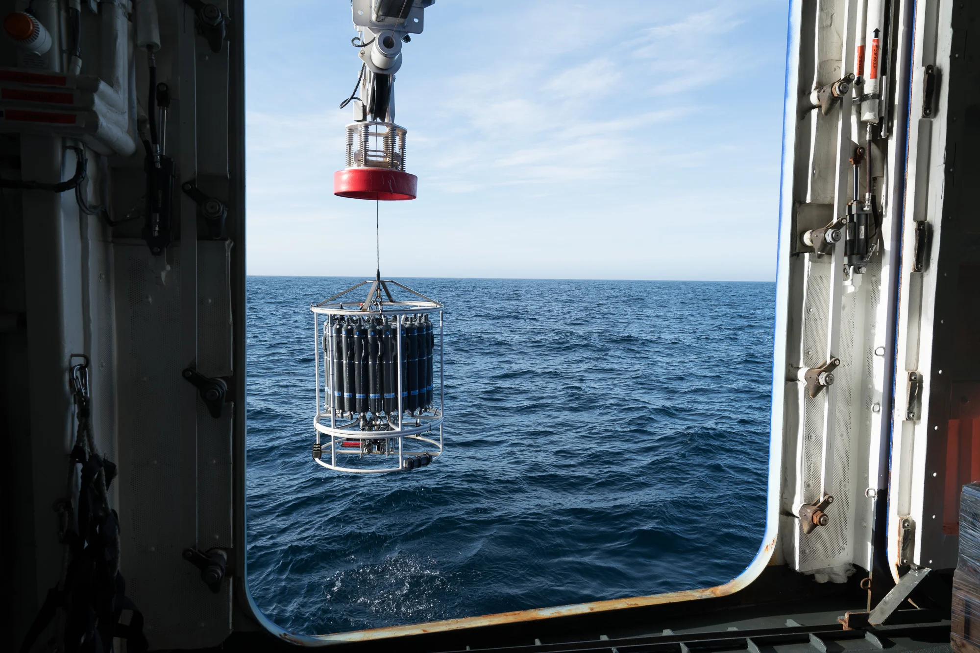 CTD rosette recovery through the Baltic Room of the R/V Sikuliaq . Photo credit: Andrew McDonnell
