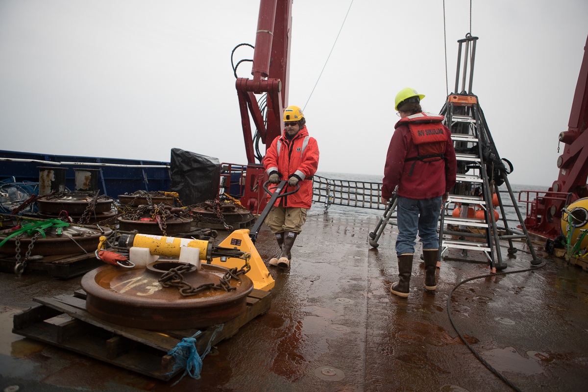 Peter Shipton carts into position the first of six moorings to be deployed on the cruise. Photo credit: Brendan Smith
