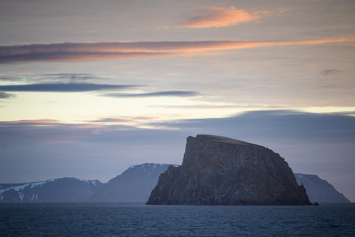 Early morning sunset over the Diomedes and Fairweather Rock. Photo credit: Brendan Smith