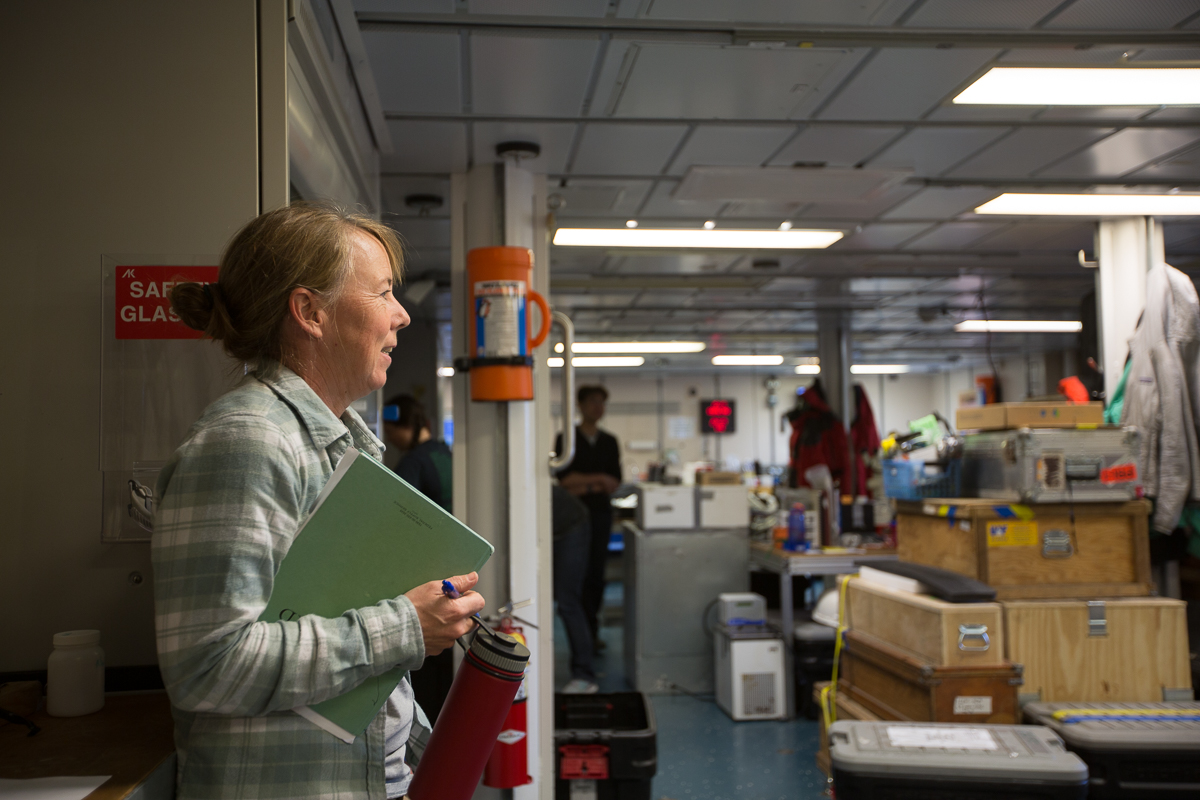 Kate Stafford jokes with Pete Shipton early on in the cruise before her shift on the bridge. Photo credit: Brendan Smith