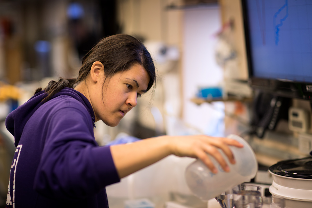 Rachel starting her water filtration from a sample collected in a niskin bottle. Photo credit: Brendan Smith