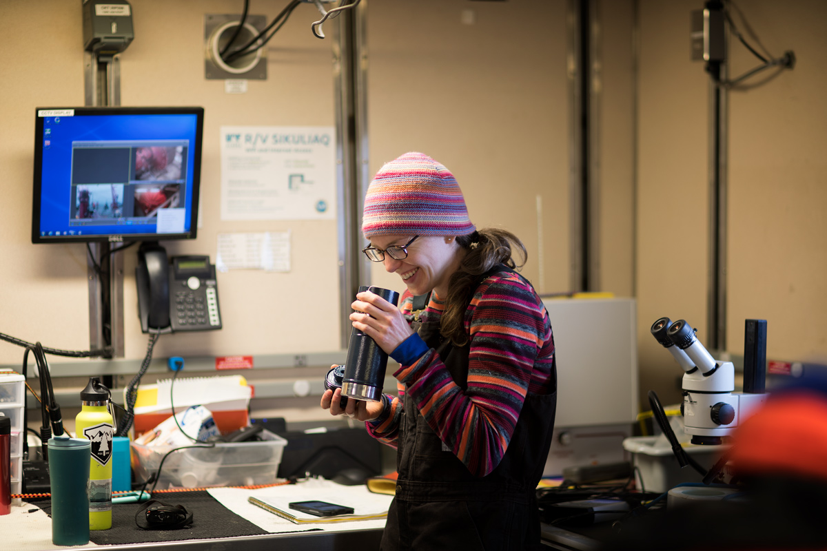 Easy to laugh, Brittany holds a thermos of tea to stay warm. Photo credit: Brendan Smith