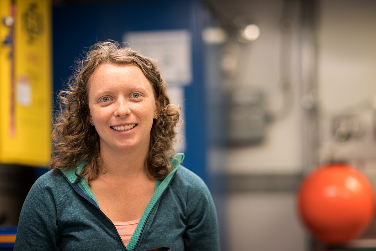 Portrait of Stephanie O'Daly by her lab station. Photo credit: Brendan Smith