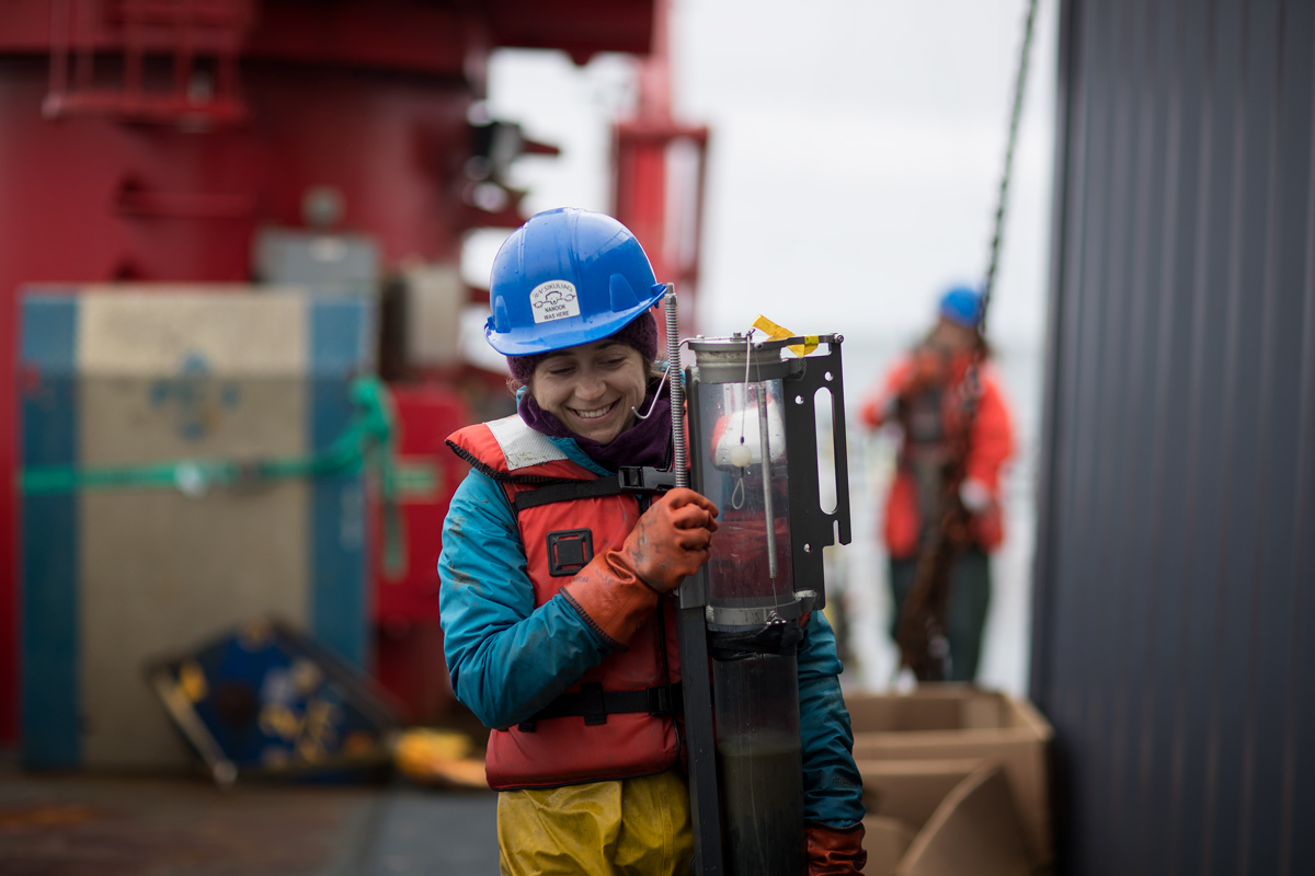 Bringing in a sediment core from a recent multi-core deployment. Photo credit: Brendan Smith