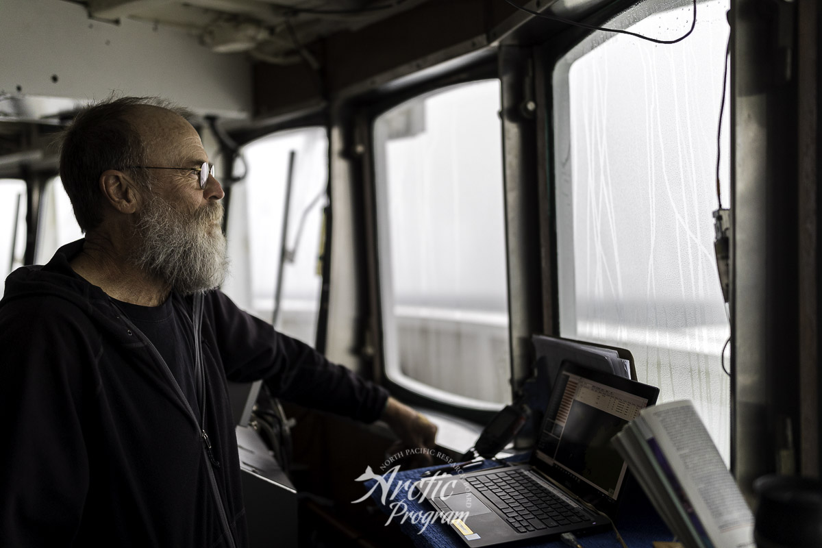 Marty Reedy scanning the 300m square grid off the starboard bow for any sea bird activity. Photo credit: Brendan Smith/NPRB