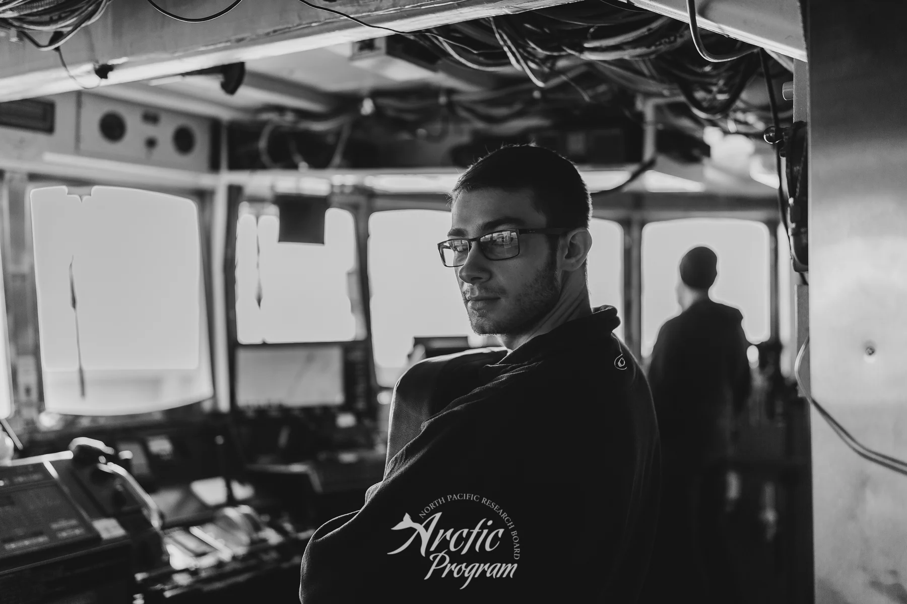 Second mate Chris Wahlers, one of the founders of the Arctic Explorers Green Flash Club, looking off at a sunset opportunity—one of six during the cruise.