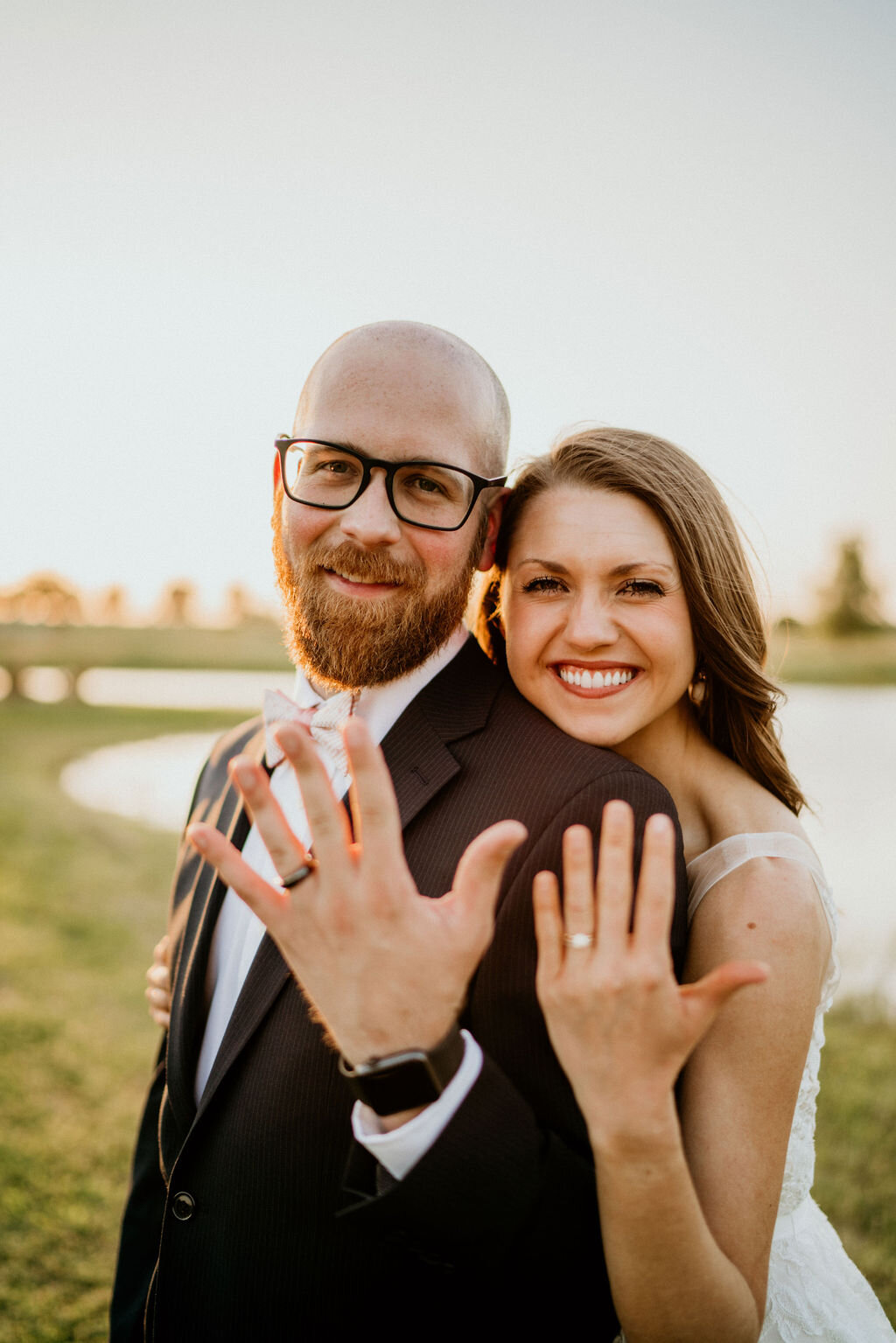 Ranch-Style Micro Wedding Bride and groom showing off rings