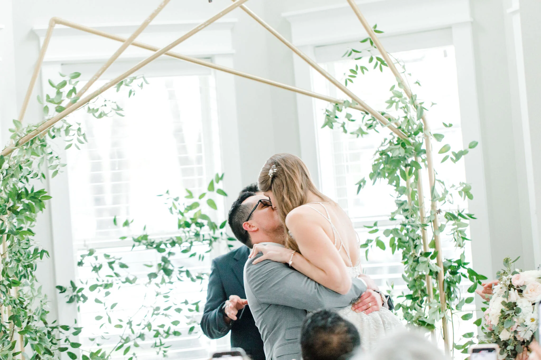 Romantic Micro Wedding Bride and groom first kiss