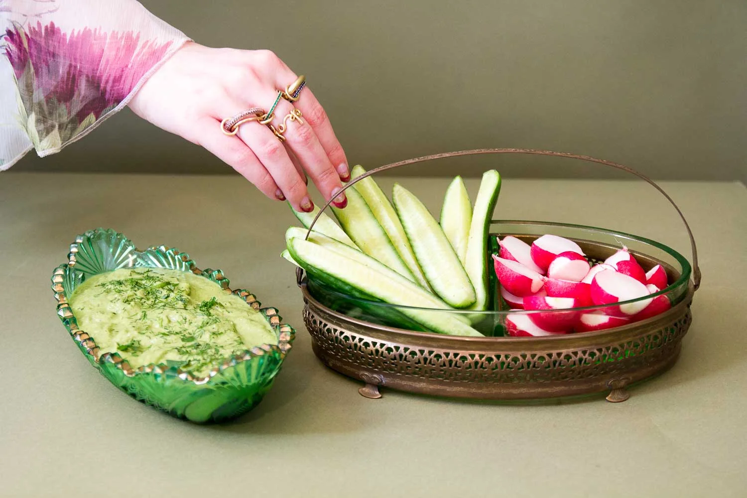 Helen America reaches for some crudité. Persian cucumbers are where it's at.