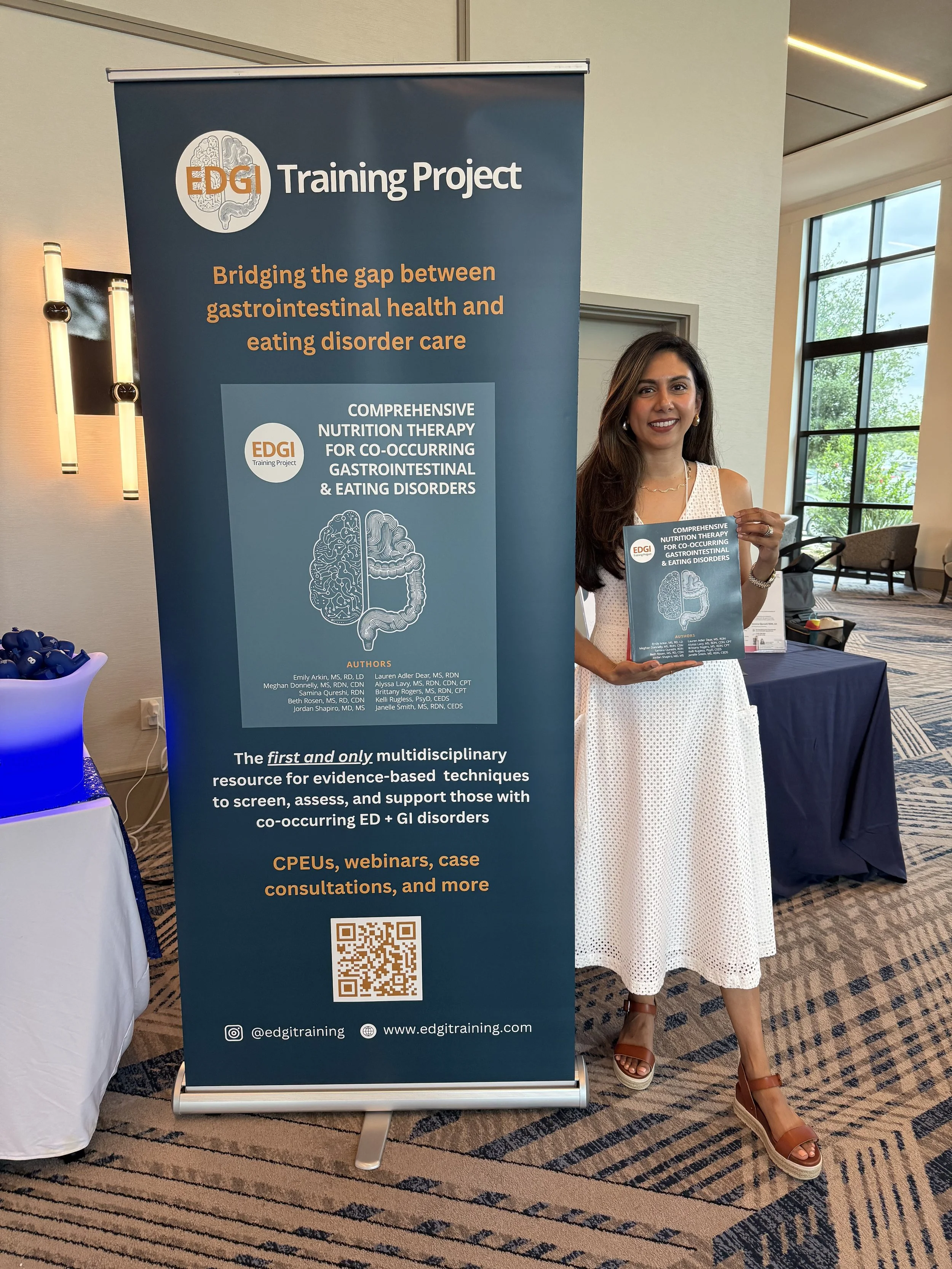Banner of EDGI Training Project with Dietitian Samina Qureshi Holding the book Comprehensive Nutrition Therapy for Co-Occurring Gastrointestinal and Eating Disorders
