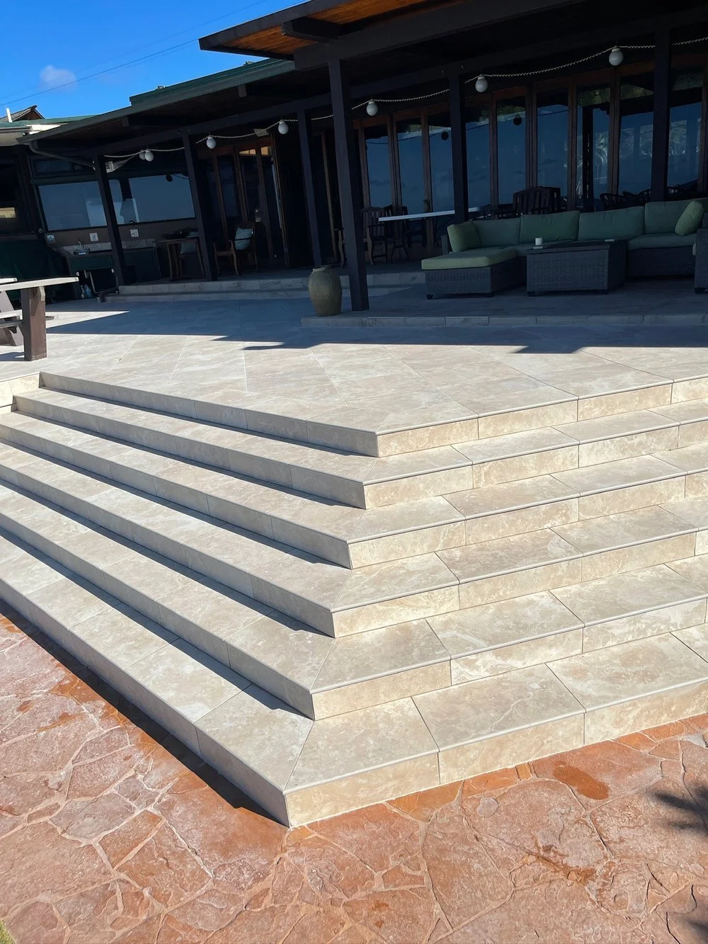 Outdoor Tiled Stairs  
 
The precise angles created by mitered edges on these outdoor tiled stairs provide a seamless transition between steps, preventing chipping and wear while also reducing the risk of slips.