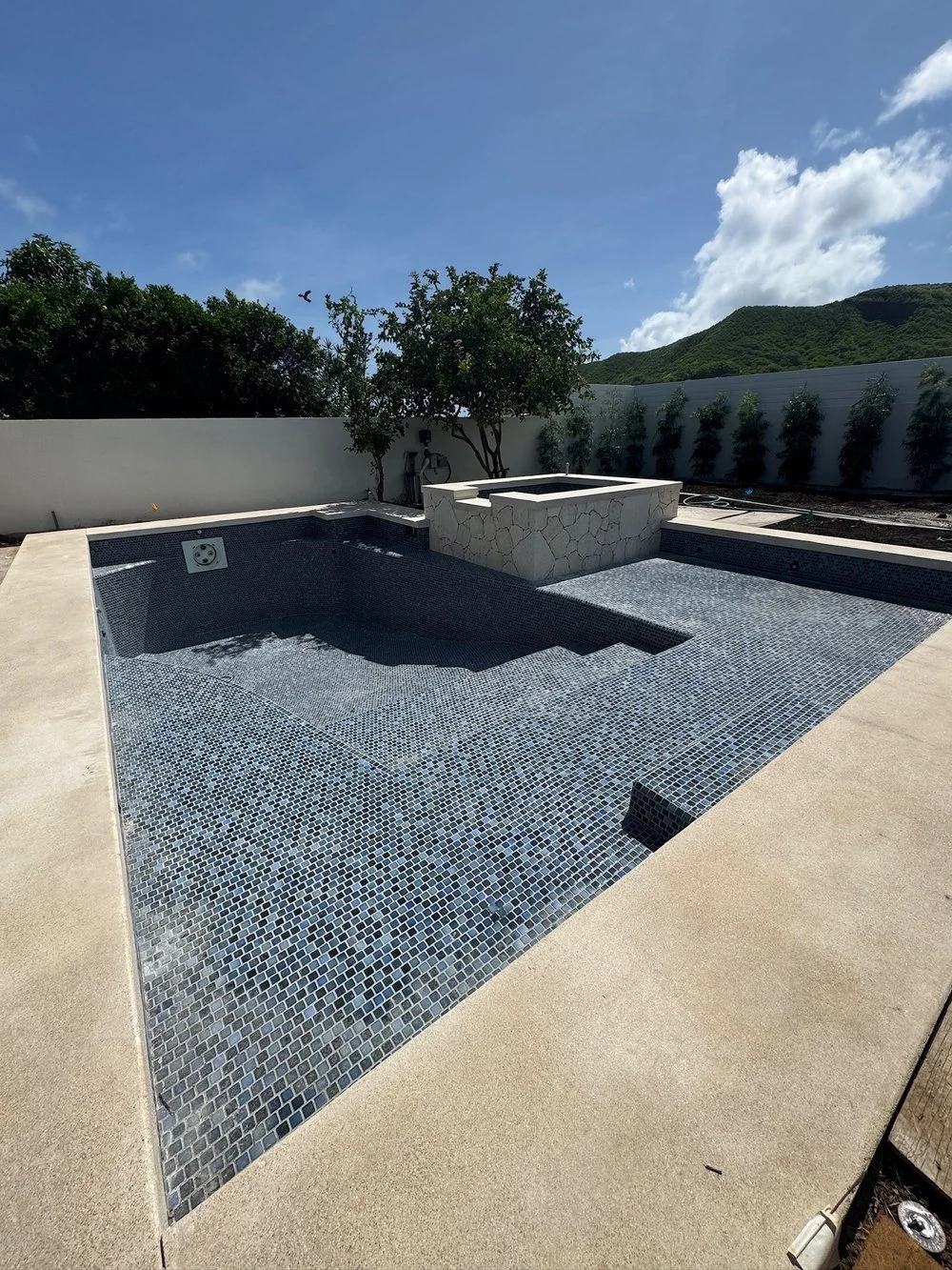 Pool tile Installation in a home in Kahala 
 
Pool tile installation at a private residence in Honolulu.