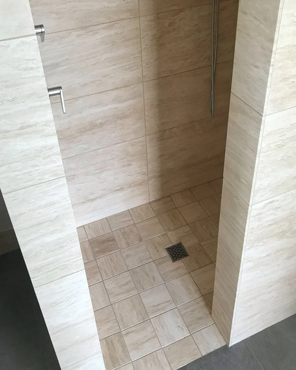 Shower Tile Detail  
 
Proper installation is essential for a shower remodel, as it ensures a watertight seal and prevents issues such as mold and mildew.